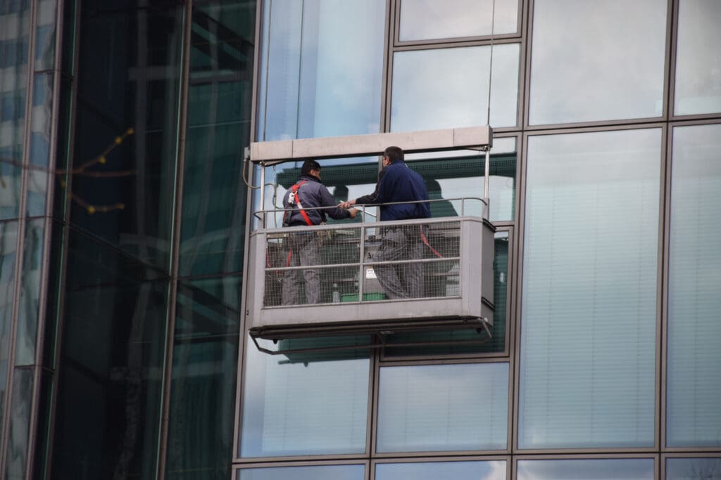 window washers cleaning commercial building