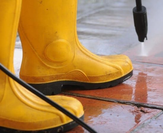 yellow boots pressure washing
